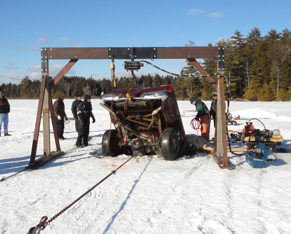 Recovery of truck that had sunk through the ice of Stetson Pond, Maine.